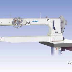 Industrial sewing machine (Juki) with large handwheel, mounted on a table; model TSC-461U visible on the side