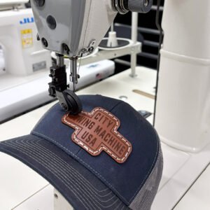 Sewing a leather patch on baseball cap